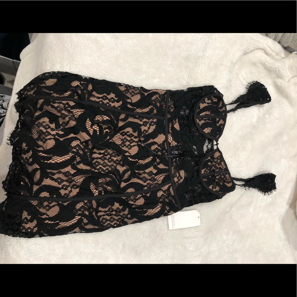 Tobi dress. Unworn with tags. Size M